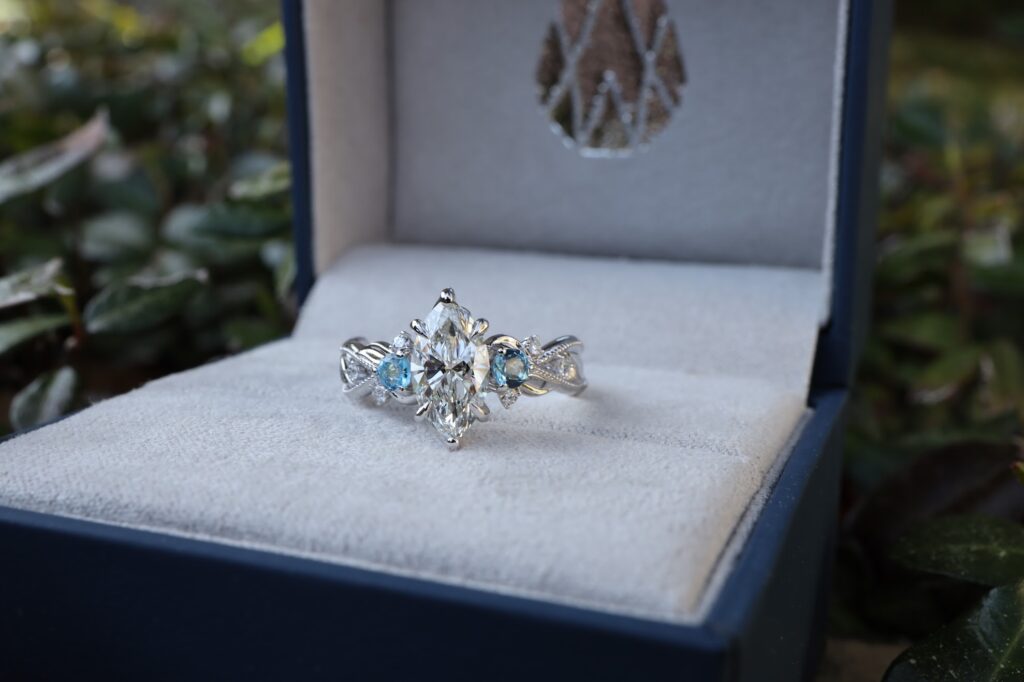 diamond and blue topaz engagement ring