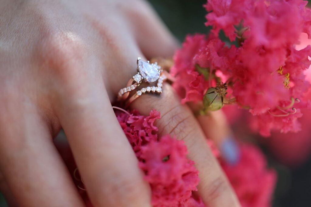 diamond ring photography in pink flowers