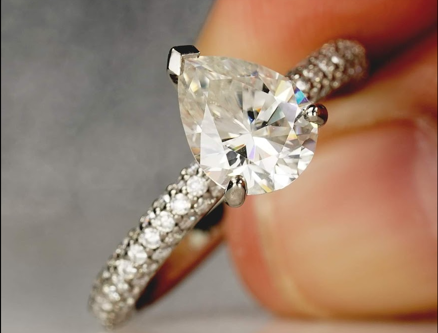 Refined elegance in moissanite gemstone ring.