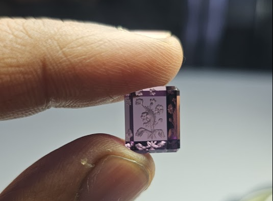 Intaglio carving with quiet clarity.