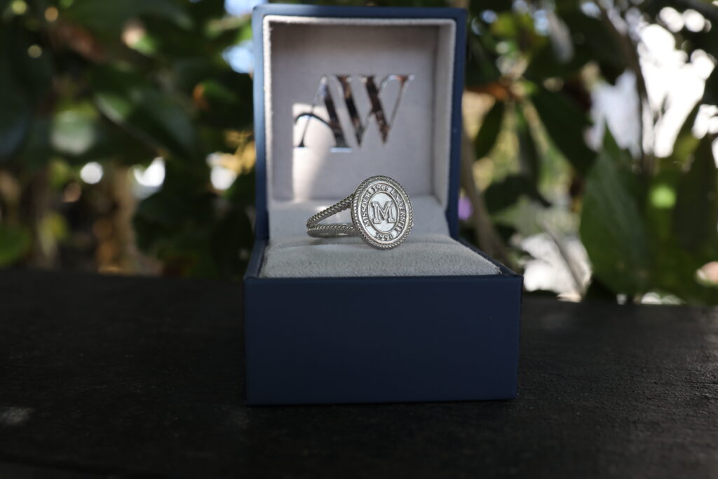 Custom engravings for men’s signet rings.